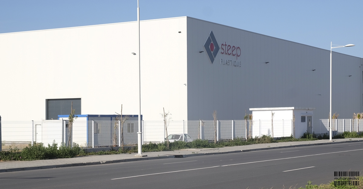 Vista exterior de pavilhão de produção de unidade industrial - Steep Marocos - CONSTRUÇÃO INDUSTRIAL - Multiprojectus